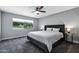 Bedroom featuring a large bed, carpet flooring and a view to the street at 347 Leisure World --, Mesa, AZ 85206