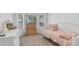 Charming bedroom with a cute unicorn plush and a view of the outdoors at 35 E Secretariat Dr, Tempe, AZ 85284