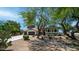 Charming single-Gathering home with mature landscaping, large driveway, and three-car garage at 35 E Secretariat Dr, Tempe, AZ 85284