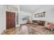 Bright living room with a wood front door and traditional-style furniture at 35 E Secretariat Dr, Tempe, AZ 85284