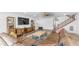 Inviting living room featuring a large sectional sofa and stylish decor at 35 E Secretariat Dr, Tempe, AZ 85284