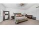 Relaxing main bedroom featuring neutral walls, ceiling fan, and comfortable bed at 35 E Secretariat Dr, Tempe, AZ 85284
