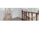 Carpeted staircase with wooden railing, leading to upper level at 35 E Secretariat Dr, Tempe, AZ 85284