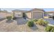 Charming home featuring low-maintenance desert landscaping, and a well-manicured front yard at 3649 E Hazeltine Way, Chandler, AZ 85249