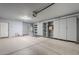 Bright garage featuring built-in cabinets, providing plenty of room for storage and organization at 3649 E Hazeltine Way, Chandler, AZ 85249