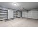 Spacious garage featuring built-in storage cabinets and an automatic door opener for added convenience at 3649 E Hazeltine Way, Chandler, AZ 85249