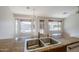 Kitchen sink in island, with backyard views from dining area windows at 3649 E Hazeltine Way, Chandler, AZ 85249