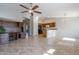 Spacious living area with custom desk nook and views into the kitchen at 3649 E Hazeltine Way, Chandler, AZ 85249