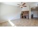 Bright living room with neutral paint, ceiling fan, and tile floors at 3649 E Hazeltine Way, Chandler, AZ 85249