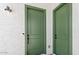View of the front doors with hardware and outdoor lighting at 37727 W Padilla St, Maricopa, AZ 85138
