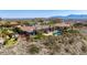 Majestic desert home showing manicured lawn and mountain views at 402 E Windmere Dr, Phoenix, AZ 85048