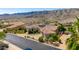 Expansive home showing desert landscaping, solar panels, and mountain views at 402 E Windmere Dr, Phoenix, AZ 85048