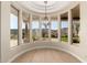 Dining area with large windows offering stunning mountain views at 402 E Windmere Dr, Phoenix, AZ 85048