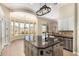 Well-appointed kitchen showcasing an island, views of the outdoors, and a spacious design at 402 E Windmere Dr, Phoenix, AZ 85048