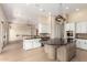 Kitchen with a large central island, stainless steel appliances, and an open design at 402 E Windmere Dr, Phoenix, AZ 85048