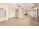 Open floor plan showcasing a living room with access to the kitchen and an archway at 402 E Windmere Dr, Phoenix, AZ 85048