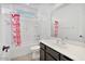 Bright bathroom featuring a vanity and a tub with a shower at 4125 W Gary Way, Laveen, AZ 85339