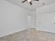 Bedroom featuring tile flooring, a ceiling fan and a double door closet at 4125 W Gary Way, Laveen, AZ 85339