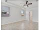 A spacious bedroom is illuminated by natural light and features a ceiling fan at 4125 W Gary Way, Laveen, AZ 85339