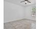 Bedroom with tile flooring, a ceiling fan, and a view out the window at 4125 W Gary Way, Laveen, AZ 85339