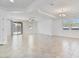 Bright, airy living room with multiple windows and doors for natural light, plus stylish tile floors throughout at 4125 W Gary Way, Laveen, AZ 85339