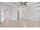 A spacious main bedroom features tile floors, natural light, ceiling fan, and access to the main bath at 4125 W Gary Way, Laveen, AZ 85339