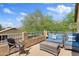 Cozy outdoor seating area on a private balcony with wrought iron furniture at 4976 E Thunderbird Dr, Chandler, AZ 85249