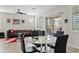 Open-concept living and dining area, featuring stylish furnishings and natural light at 4976 E Thunderbird Dr, Chandler, AZ 85249