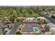 Aerial view of this beautiful property showcasing the pool, landscaping and surrounding area at 524 W Sunset Cir, Mesa, AZ 85201