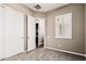Bedroom with closet, neutral paint, and window with shutters at 5541 W Desperado Way, Phoenix, AZ 85083