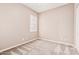 This light, airy bedroom with cozy carpeting features large windows with plantation shutters at 5541 W Desperado Way, Phoenix, AZ 85083