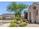 Beautiful home exterior featuring desert landscaping, mountain views, and a brick driveway at 5541 W Desperado Way, Phoenix, AZ 85083