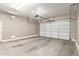 Clean, spacious garage interior with an automatic door, ready for vehicle and storage at 5541 W Desperado Way, Phoenix, AZ 85083