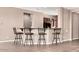 Kitchen area with bar seating perfect for casual dining and entertaining at 5541 W Desperado Way, Phoenix, AZ 85083