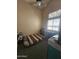 Bedroom featuring a desk, a bed, a window, and gray carpeting at 6036 W Mescal St, Glendale, AZ 85304