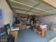 Spacious two-car garage, with plenty of room for storage, bikes, and other equipment at 6036 W Mescal St, Glendale, AZ 85304
