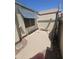 View of the private courtyard patio with a bench and space for outdoor enjoyment at 6036 W Mescal St, Glendale, AZ 85304
