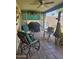 Covered patio featuring outdoor furniture, a ceiling fan, a fireplace, and a grill for comfortable outdoor living at 6036 W Mescal St, Glendale, AZ 85304
