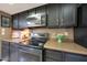 Modern kitchen featuring stainless steel appliances and stylish countertops at 7368 E Pleasant Run, Scottsdale, AZ 85258