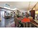 Spacious living room with hardwood floors, elegant decor, and skylight at 7368 E Pleasant Run, Scottsdale, AZ 85258