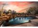 Backyard pool area with well maintained desert landscaping at 7552 E Whisper Rock Trl, Scottsdale, AZ 85266