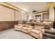 Deluxe home theater with reclining seats, cup holders, and projector for immersive entertainment at 7552 E Whisper Rock Trl, Scottsdale, AZ 85266