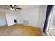 Cozy bedroom with closet, ceiling fan, carpet floor, and a window overlooking the outdoor space at 8541 W Pershing Ave, Peoria, AZ 85381