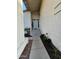Inviting entryway with landscaped walkway leading to a secure white-colored screen door at 8541 W Pershing Ave, Peoria, AZ 85381