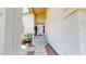 Inviting front entrance with a white front door, desert landscaping, and a welcoming porch at 8541 W Pershing Ave, Peoria, AZ 85381