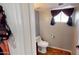 Cozy half bathroom with neutral walls and tile flooring at 8541 W Pershing Ave, Peoria, AZ 85381