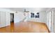 Spacious living room with hardwood floors, staircase, and ample natural light at 8541 W Pershing Ave, Peoria, AZ 85381