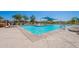 Enjoy a refreshing dip in the community pool, surrounded by comfortable lounge chairs at 9345 W Robin Ln, Peoria, AZ 85383