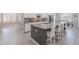 Beautiful kitchen with island seating, stylish finishes, and open layout for easy entertaining at 9345 W Robin Ln, Peoria, AZ 85383