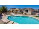 Backyard pool featuring a fenced in lounge area, perfect for outdoor enjoyment at 9345 W Robin Ln, Peoria, AZ 85383